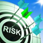 Risk On Dartboard Showing Dangerous Stock Photo