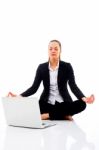 Businesswoman Doing Yoga Stock Photo