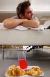 Man Having Breakfast In Bed Stock Photo