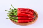 Red Chili Pepper On A White Background Stock Photo