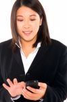 Asian Businesswoman With Mobile Stock Photo