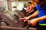 Woman Running On Treadmill Stock Photo