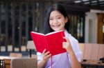 Asia Thai High School Student Uniform Beautiful Girl Read A Book Stock Photo