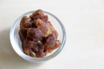 Ripe Tamarind In Bowl On Wood Background Stock Photo