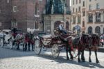 Carriage And Horses In Krakow Stock Photo