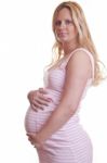 Pregnant Woman Holding Tummy Stock Photo