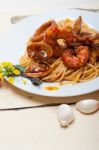 Italian Seafood Spaghetti Pasta On Red Tomato Sauce Stock Photo