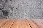 Top Of Wood Table On Old Concrete Wall Background Stock Photo