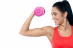 Pretty Woman Working Out With Dumbbell Stock Photo