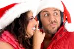 Couple Wearing Christmas Hat Stock Photo