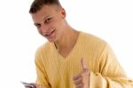 Handsome Male Showing Good Luck Sign Stock Photo