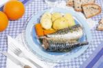 Mackerel Fish With Potato And Carrot Stock Photo