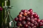 Red Grapes And Wine Glasses Stock Photo