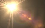 Abstract Sun Burst With Digital Lens Flare Background Stock Photo