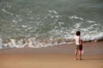 Standing On The Beach Stock Photo