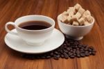 Coffee Cup And Saucer On A Wooden Table Stock Photo