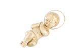 Golden Baby Jesus Lying On White Stock Photo