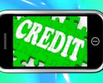 Credit On Smartphone Shows Money Loan Stock Photo