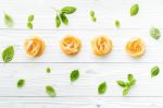 Ingredients For Homemade Pasta On Wooden Background Stock Photo