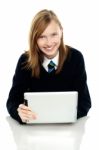 Pretty Schoolgirl Holding Newly Launched Tablet Pc Stock Photo