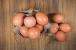 Eggs In Basket On Wood.eggs.egg.brown.rawfood Stock Photo