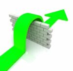 Green Arrow Over Wall Means Overcome Obstacles Stock Photo