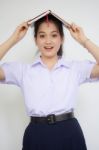 Asia Thai High School Student Uniform Beautiful Girl Read A Book Stock Photo