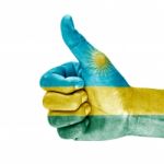 Flag Of Rwanda On Thumb Up Hand Stock Photo