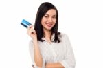 Business Lady Showing Credit Card To Camera Stock Photo