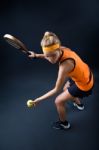 Beautiful Woman Playing Padel Indoor. Isolated On Black Stock Photo