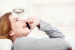 Woman Have Joyful Talk Over Phone Stock Photo