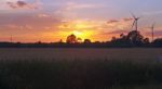 Sunset & Wind Turbines Stock Photo