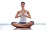 Beautiful Young Woman Doing Yoga Exercises At Home Stock Photo