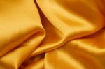 Golden Satin Background Stock Photo