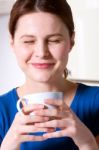 Woman Drinking A Cup Of Tea Stock Photo