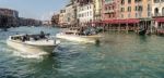 Motorboats Cruising Down The Grand Canal Stock Photo