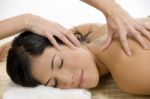 Young Woman Receiving Back Massage Stock Photo