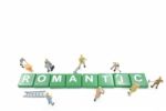 Miniature Worker Team Building Word Romantic On White Background Stock Photo