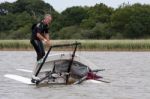 Yachtsman Attempting To Right His Dinghy On Hickling Broad Stock Photo