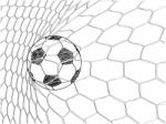 Soccer Football In Goal Net Stock Photo