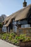 View Of A Thatched Cottage In Micheldever Hampshire Stock Photo