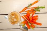 Fresh Hummus Dip With Raw Carrot And Celery Stock Photo