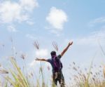 Raised Your Hands Up For A New Day Stock Photo