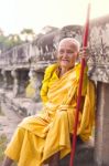 An Unidentified Old Buddhist Female Monk Dressed In Orange Toga Stock Photo