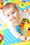 Infant Boy On Playmat Stock Photo