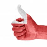 Flag Of Tonga On Thumb Up Hand Stock Photo