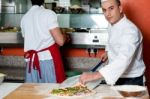 Chef Busy In Preparing Pizza Stock Photo