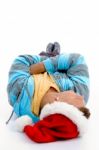 Laying Man With Christmas Hat Stock Photo