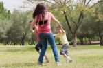 Mother Playing With Children Stock Photo