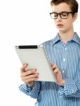 teenage Boy Using Touchpad Device Stock Photo